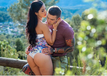 Outdoor Sex Toys: A couple enjoying intimate moments in a scenic outdoor setting surrounded by nature.