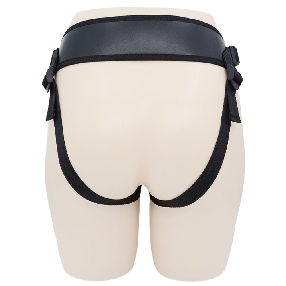 Back view of an adjustable lumbar support belt showcasing the synthetic leather design and adjustable straps.