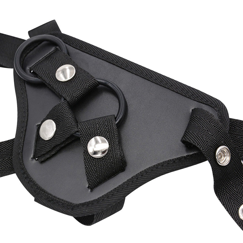 Close-up of adjustable lumbar support belt showing detachable O-rings and secure fastenings.