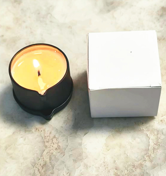 Aromatherapy Massage Candle for sex with a low-temperature burn beside a white box, perfect for sensual play.