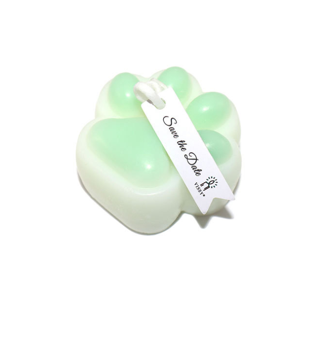 Low Temperature BDSM Cat Claw Candle in paw shape with green and white wax, featuring a 'Save the Date' tag.
