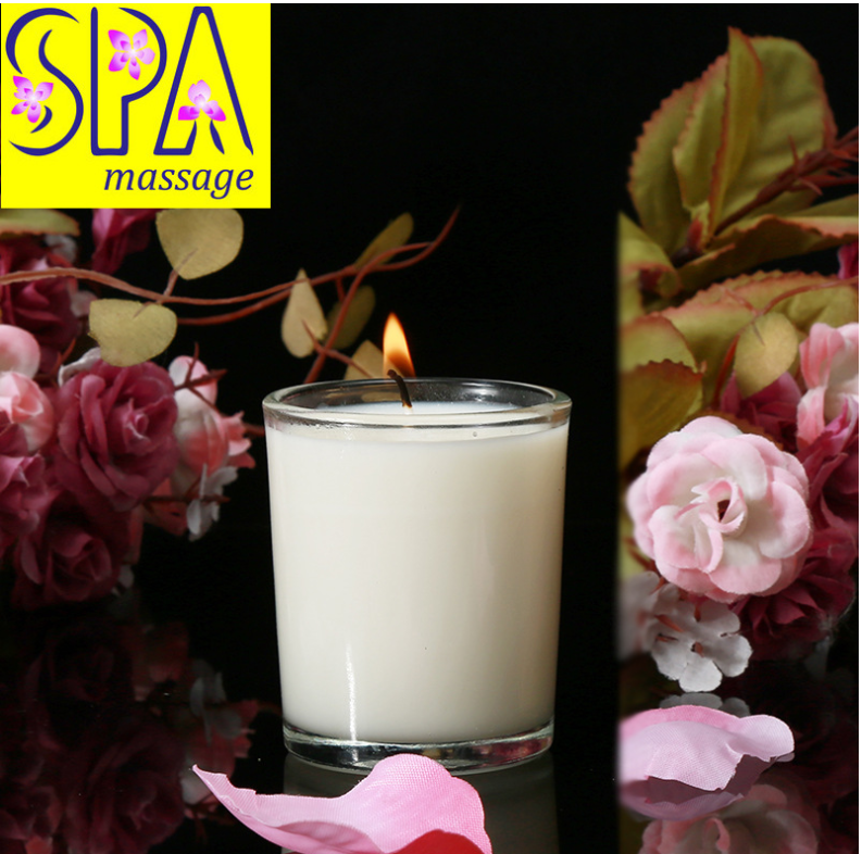Aromatherapy Massage Candle for sex, coconut wax, smokeless candle surrounded by rose petals.