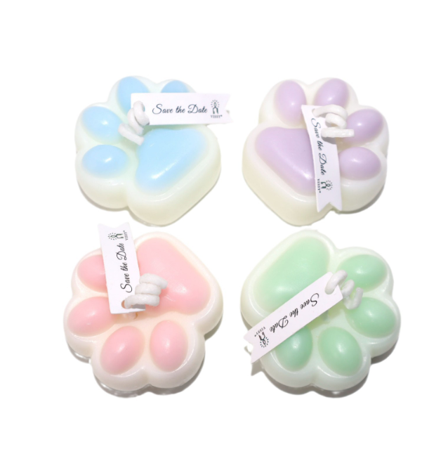Low Temperature BDSM Cat Claw Candle in pastel colors, featuring soft wax paw shapes for safe sensual play.
