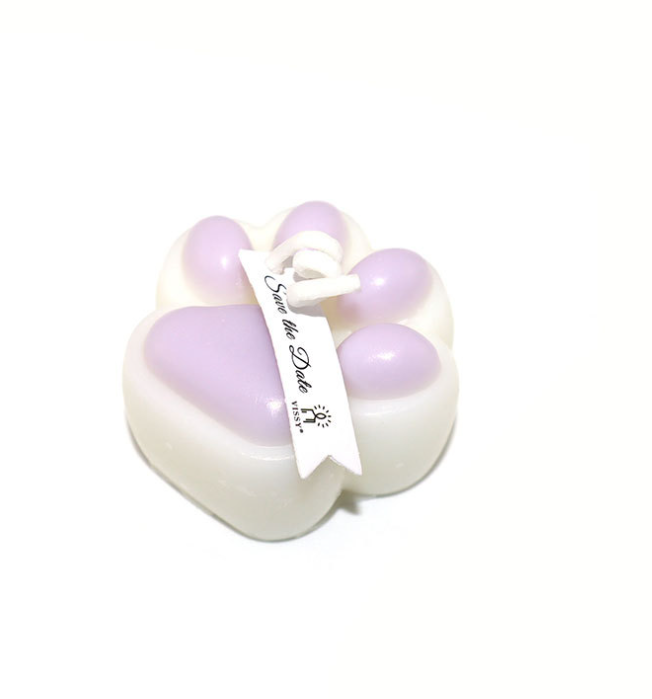 Low Temperature BDSM Cat Claw Candle in paw shape with lavender and white, ideal for safe wax play and intimate moments.