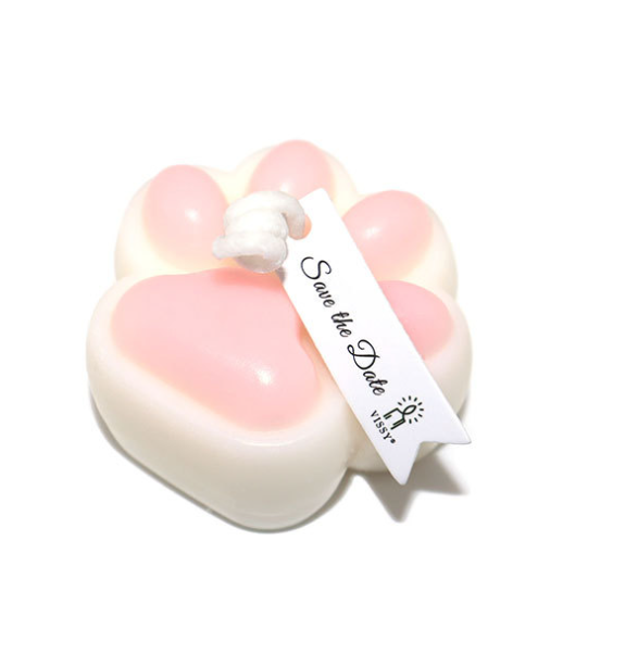 Low Temperature BDSM Cat Claw Candle in paw shape with pink and white wax, featuring a 'Save the Date' tag.